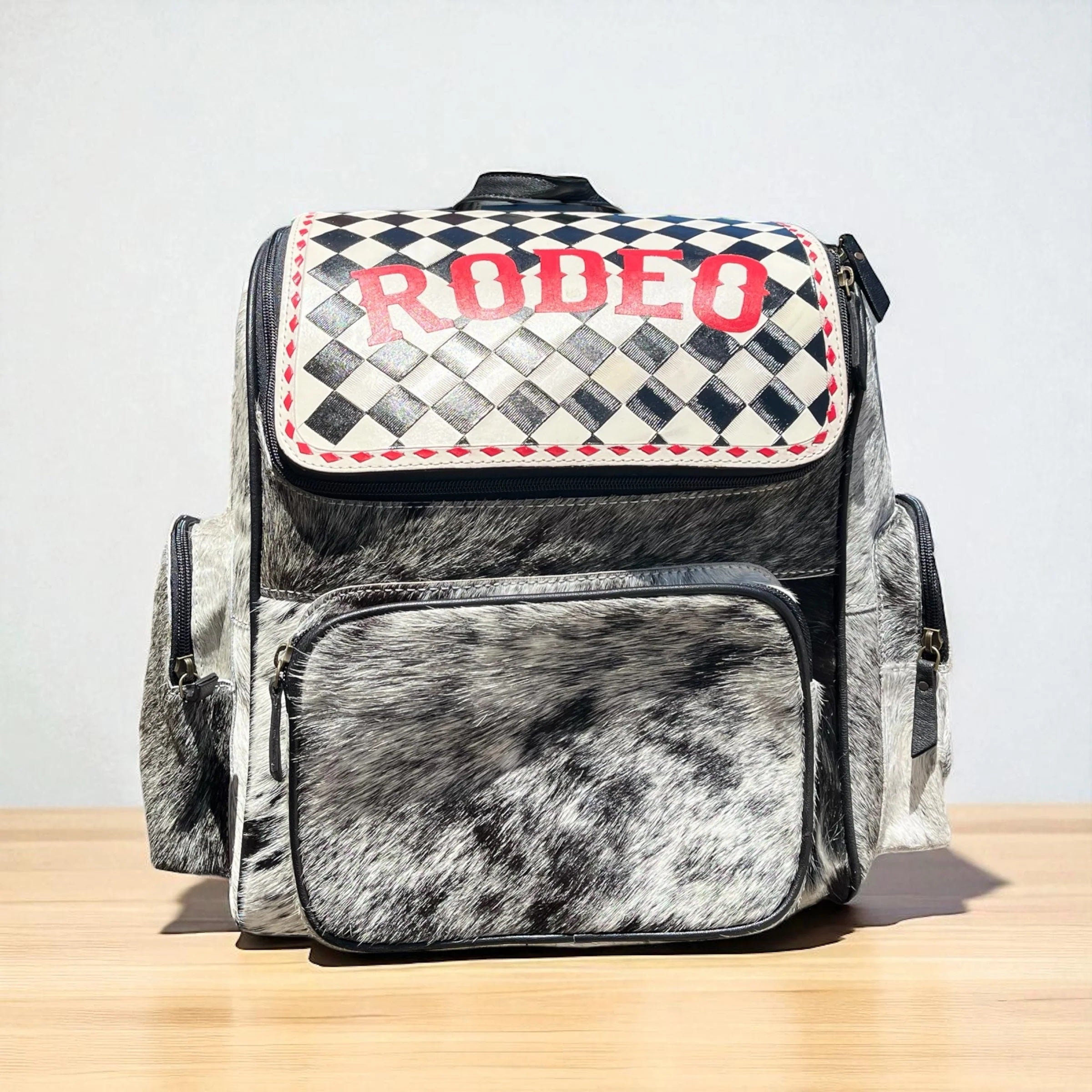 Rodeo Checker Tooled Leather & Cowhide Backpack